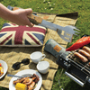 Outlaw BBQ Multi Tool being using in a picnic location.